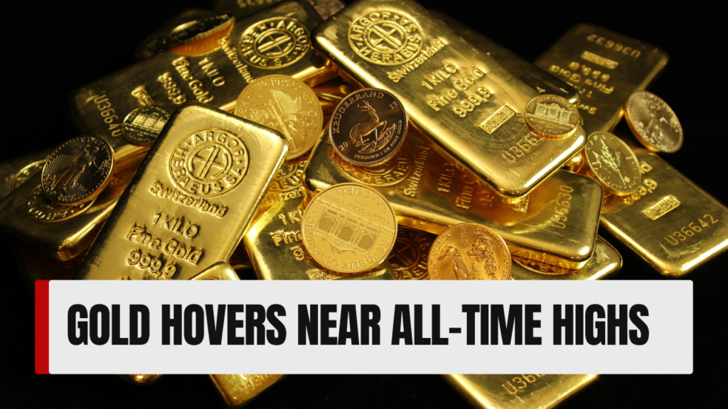 Gold hovers near all-time highs